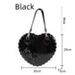 Black heart shaped handbag and measurements on a white background