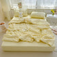 Yellow  seersucker duvet set displayed on bed.