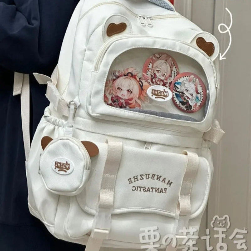 beary cute backpack with bear ears and a visible brand logo on a textured surface , white version