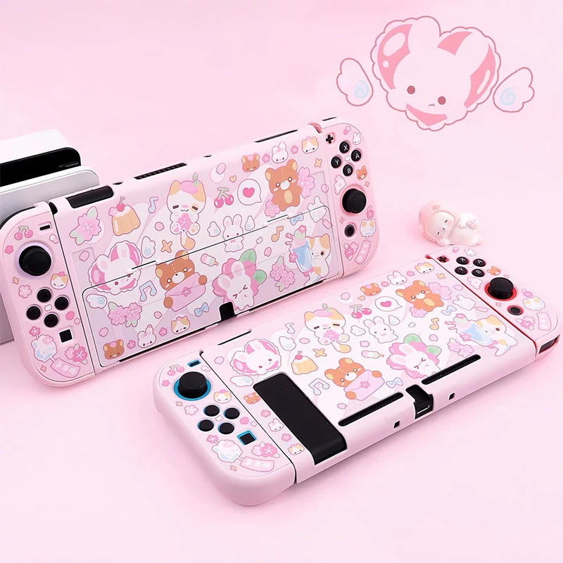 Pink gaming console with cartoon character design on a pink background