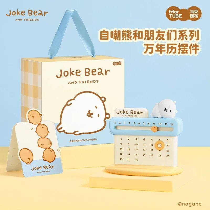 Joke Bear and Friends product set including a calendar, card, and small bear figurine on a light blue background.