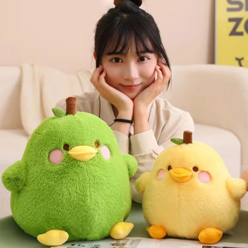 Front view of Kawaii  Cute Duck Peak Plushies in green and yellow with a woman