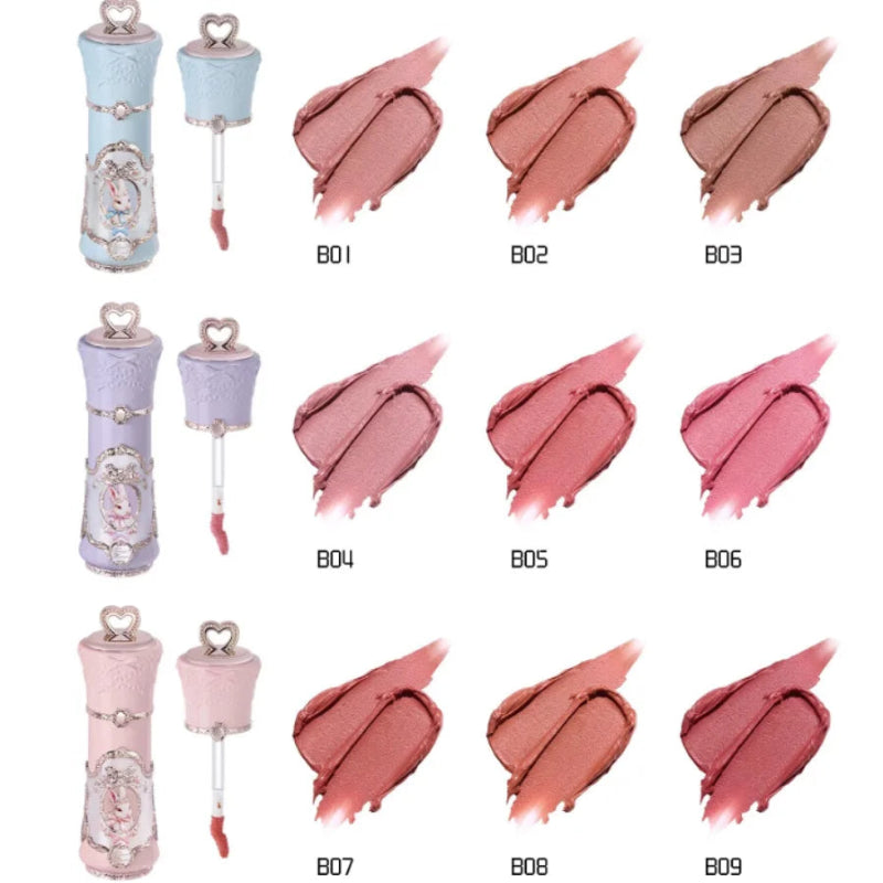 Collection of lip glosses with swatches in various shades on a white background