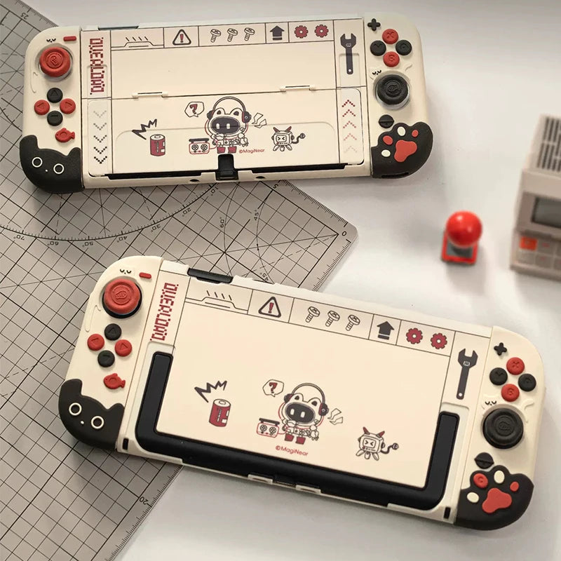 Two white gaming controllers with red and black buttons on a white surface.