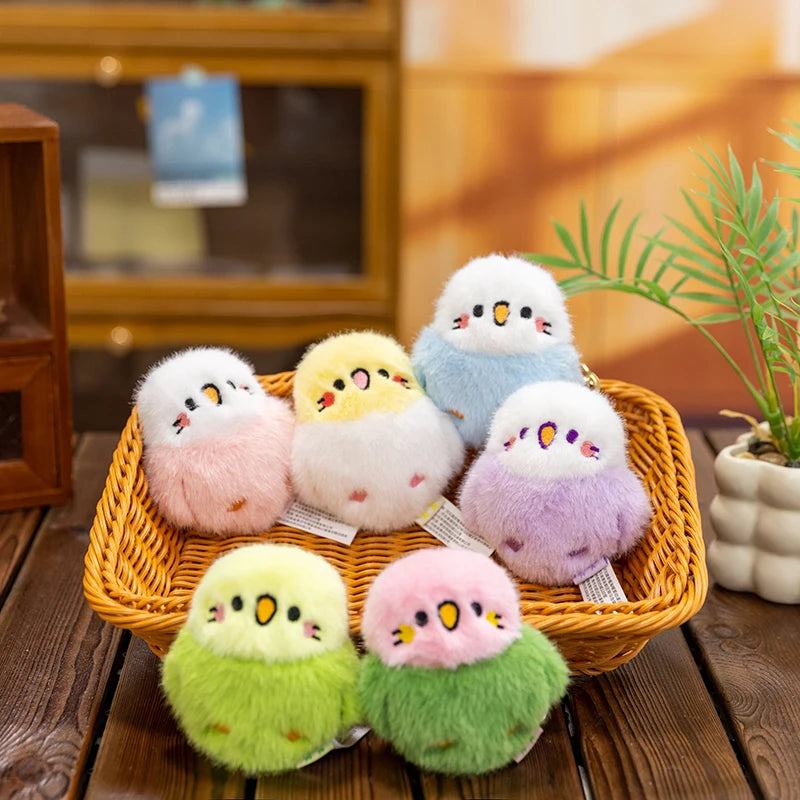 Colorful plush toys resembling birds in a woven basket on a wooden surface.