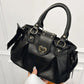 Kawaii Sweet Heart Lock Bag in black held by a woman