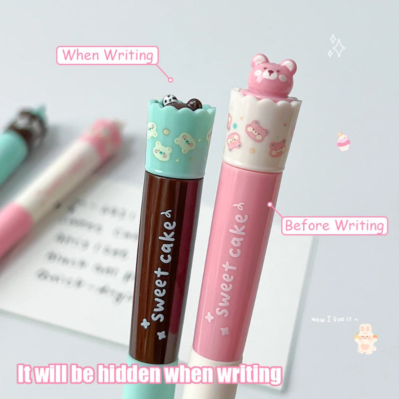 Two cartoon-themed pens with 'sweet cake' branding on a light gray background.