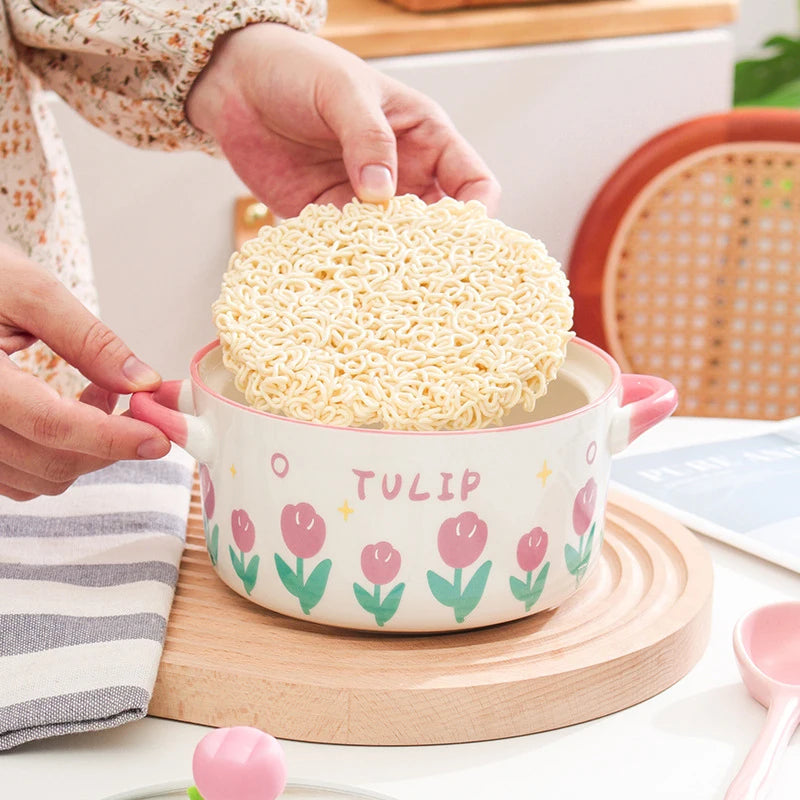 Kawaii pink Flower Ramen Bowl Set with woman adding ramen to the kitchenware for cooking 