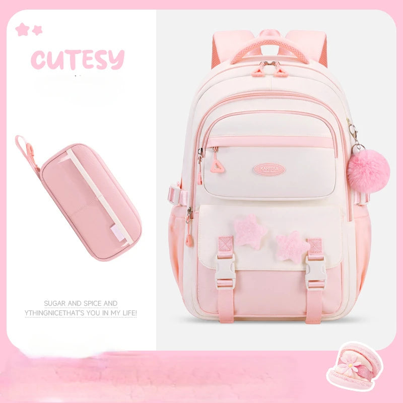 Pink backpack with accessories on a white background, featuring the brand 'Cutesy'.