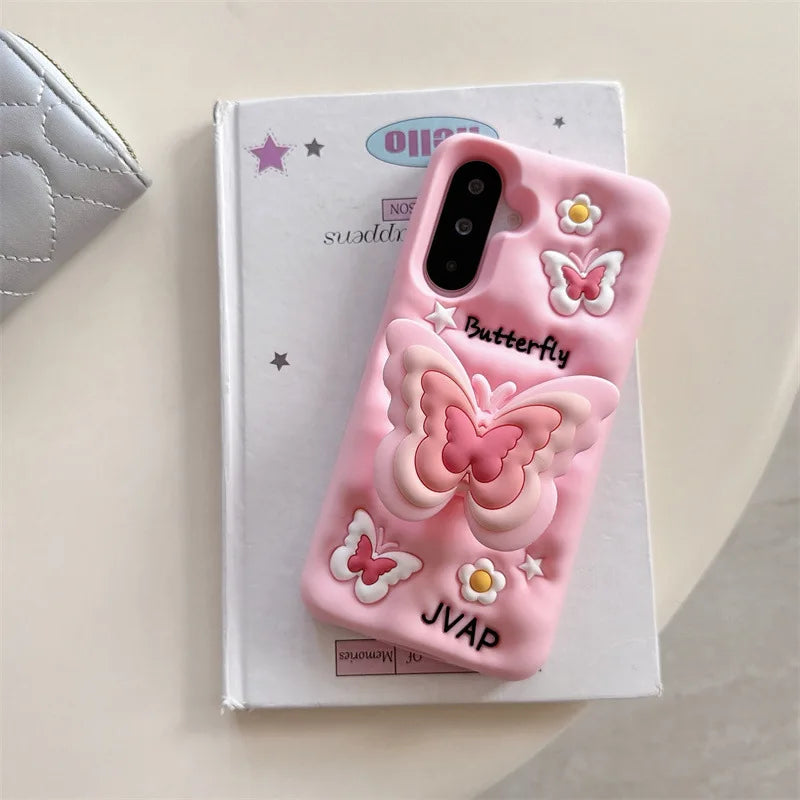 This image is showing  Kawaii Butterfly Samsung Phone Case, one option is the pink design with a large 3D butterfly in the middle with smaller butterflies around it and some white flowers.