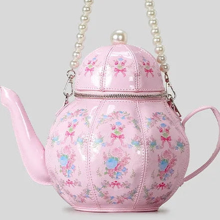 Close up of kawaii pink tea party bag highlighting the floral and bow design