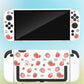 Gaming console with strawberry patterned cover on a gradient background