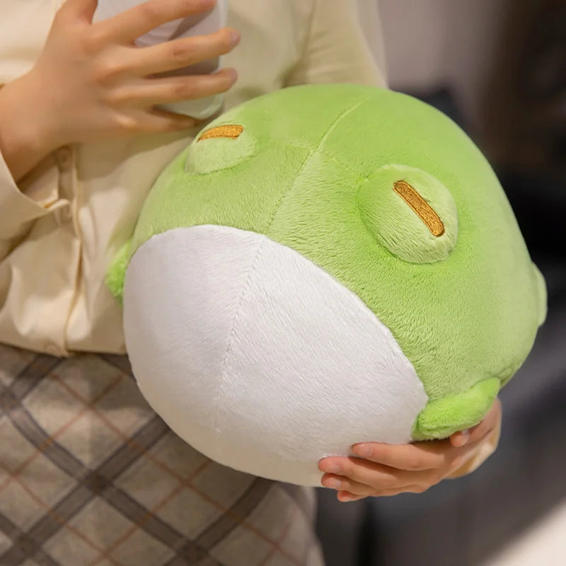 Woman holding Kawaii green and white plushie