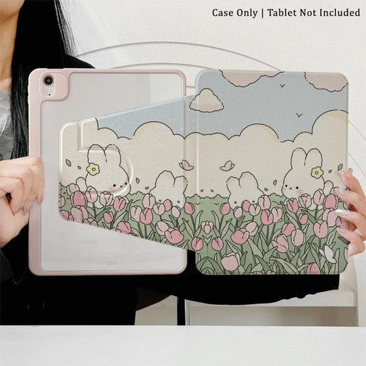 a women holding the Kawaii Tulips & Bunnies iPad Case being displayed on an ipad, bunnies in a tulip meadow with fluffy white clouds and blue sky is on the case itself.
