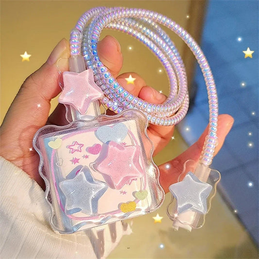 Star-shaped iphone charger cover strap with clear case held by a hand against a blurred background