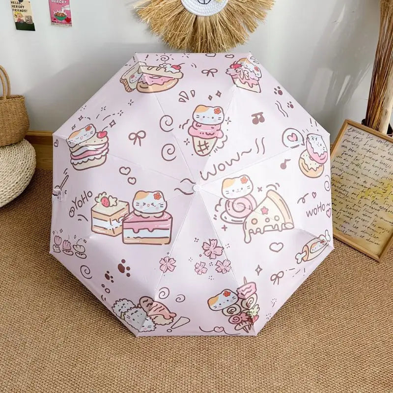 cat themed umbrella with cartoon designs on a carpeted floor