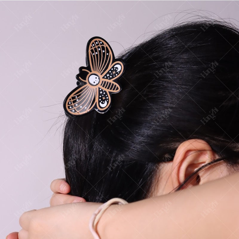 Kawaii Halloween Moth Hair Clip on a Model