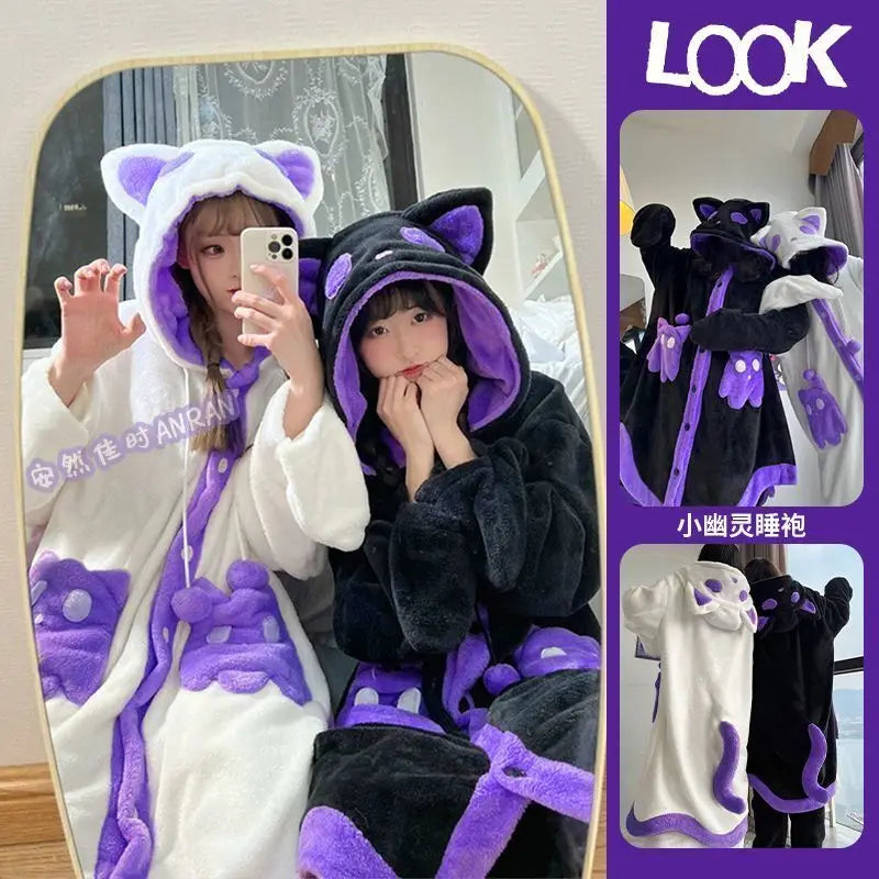 Two girls wearing plush hooded sleep robes in two colorways: one white with purple accents and one black with purple accents. The image includes a mirror selfie view on the left and a vertical product info panel on the right with the word LOOK and smaller inset views.