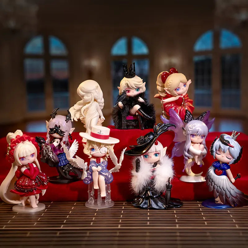 Collection of anime figurines on a red couch with a blurred indoor background
