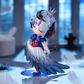 Animated character figurine with white hair, red accents, and a blue outfit in a softly lit room.