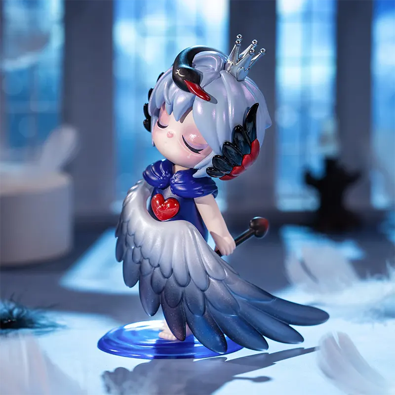 Animated character figurine with white hair, red accents, and a blue outfit in a softly lit room.
