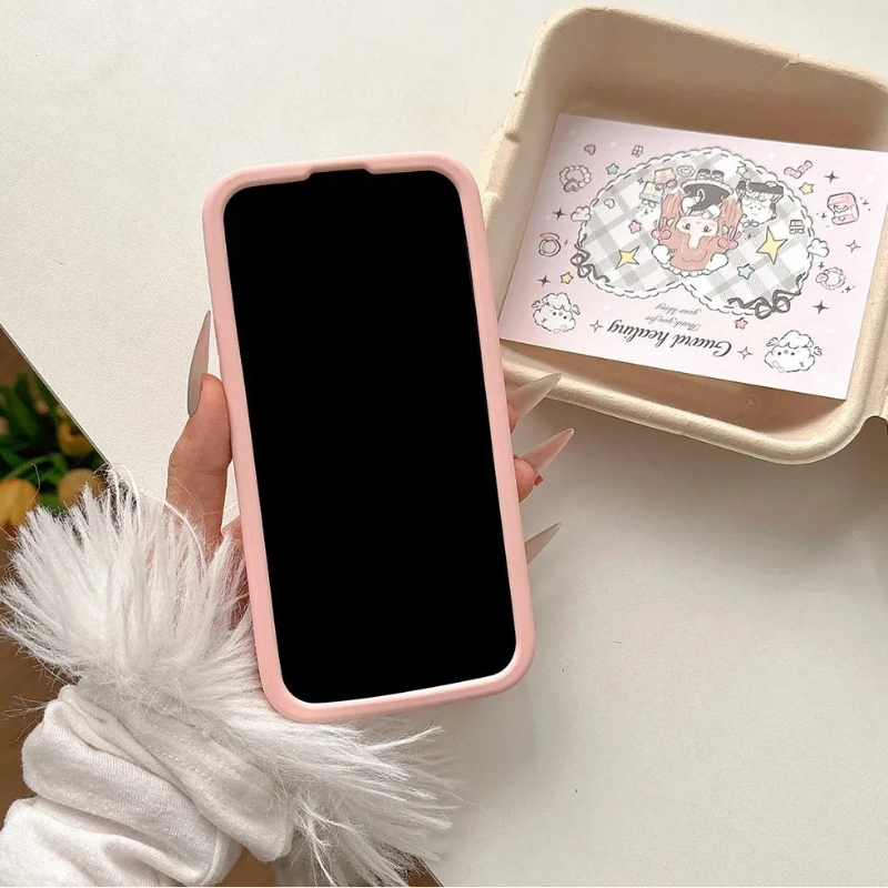 Front view of Kawaii Peach iPhone Case over a countertop held by a woman. 