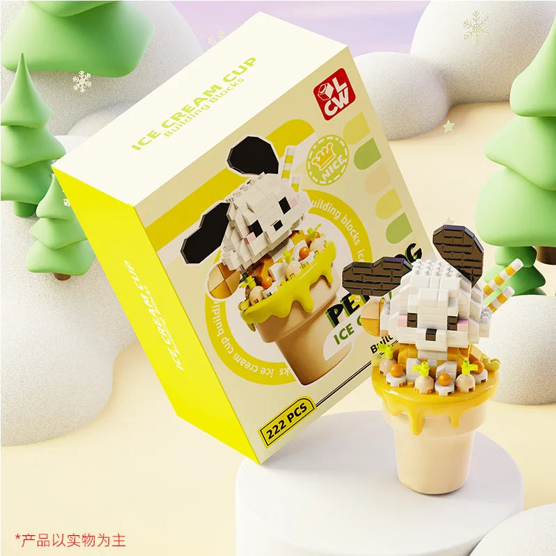 kawaii ice cream building blocks puppy edition displayed on a snowy background with its box along side it 