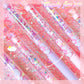 Kawaii decorative pens with unicorn designs on a pink glittery background, labeled 'Trendy fun pen'.