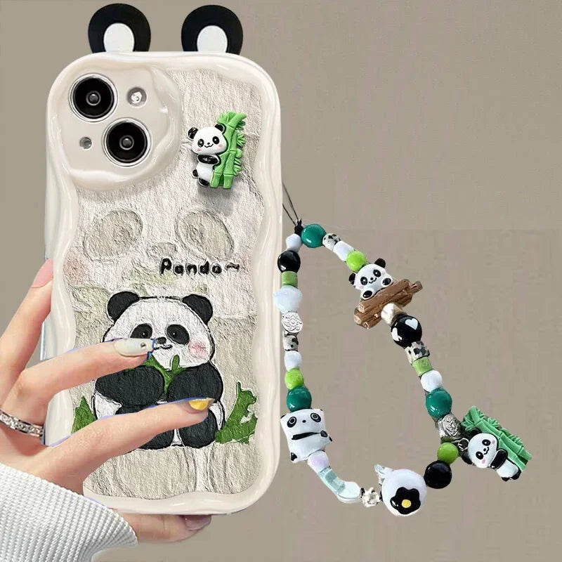 women holding a kawaii panda samsung phone white case with ears displaying a bamboo sat down eating bamboo on the case with a beaded phone charm attached 