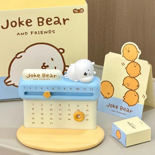 Calendar with Joke Bear and Friends branding, including a small bear figure and stationery items.
