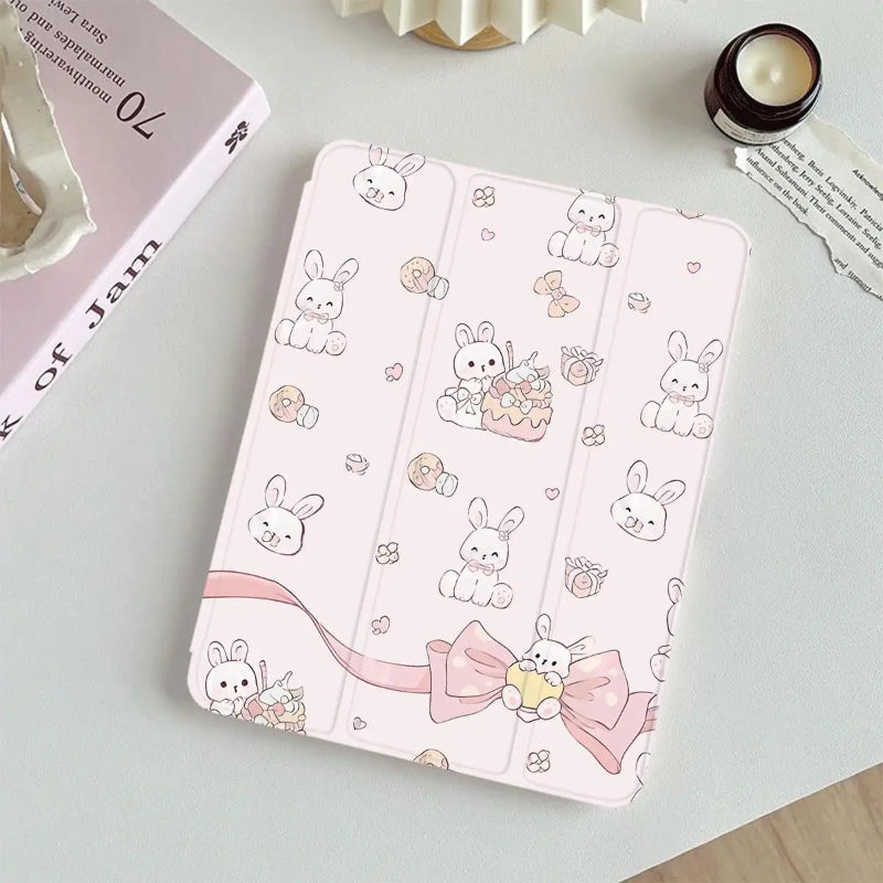 Cute tablet case with cute rabbit and bow pattern on a light surface