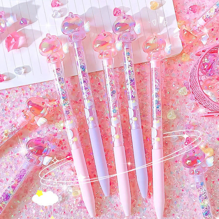 Set of pink pens with decorative elements on a pink background