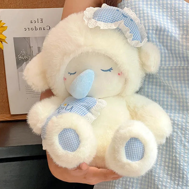 Cute plush lamb toy with blue accents held by a person wearing a matching dress.