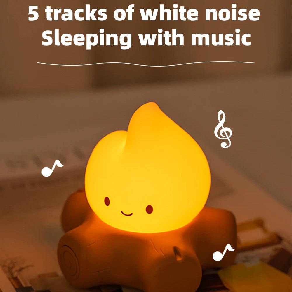 Cute night light with a smiling face on a surface, labeled '5 tracks of white noise Sleeping with music'.