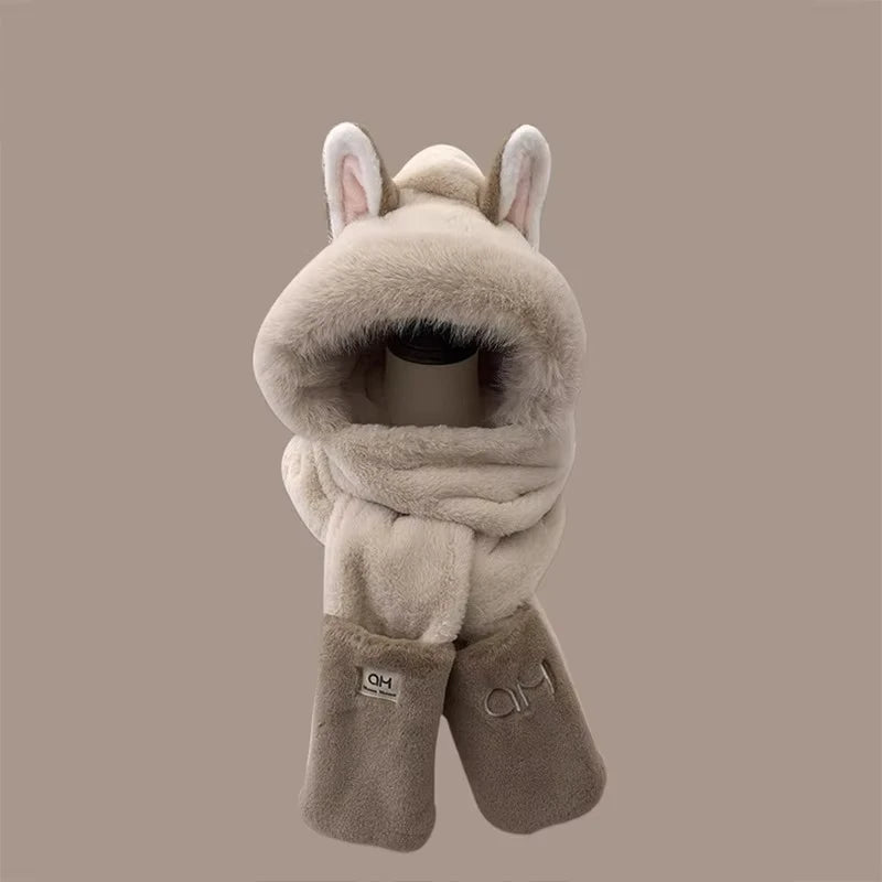 Plush animal-like head cover with ears and scarf on a beige background