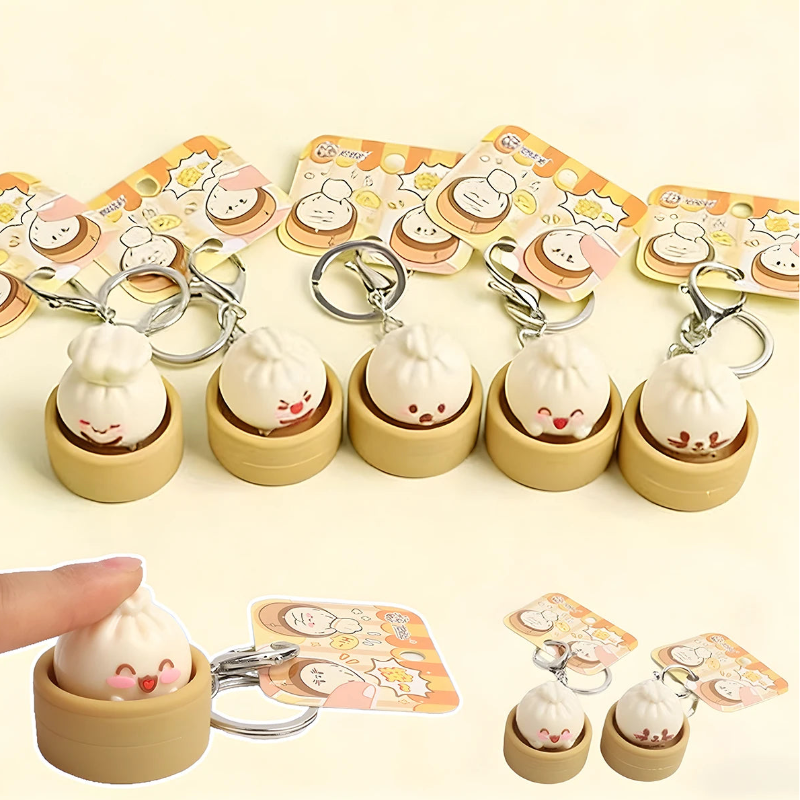 Set of cute keychains with smiling face designs in wooden holders on a white background.