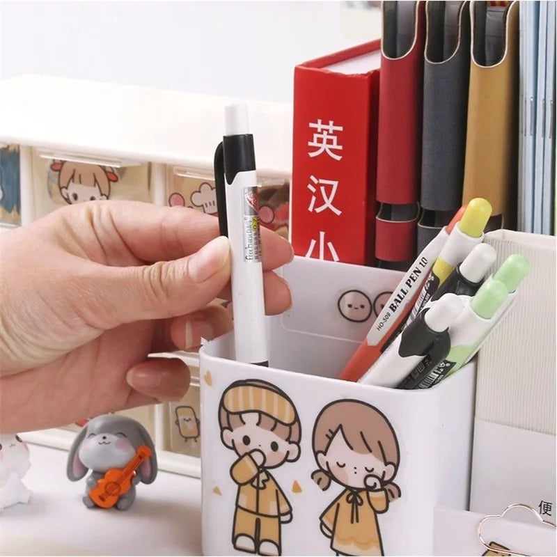 hand holding a pen in a pend holder