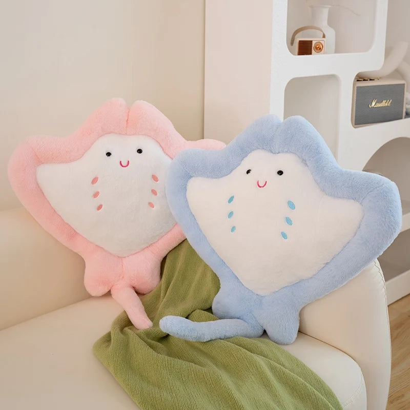 Kawaii Manta Ray Plushie on couch and blanket