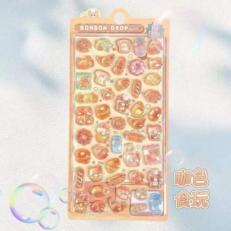 Pack of Bonbon Drop stickers with a pastel color scheme on a light blue background.