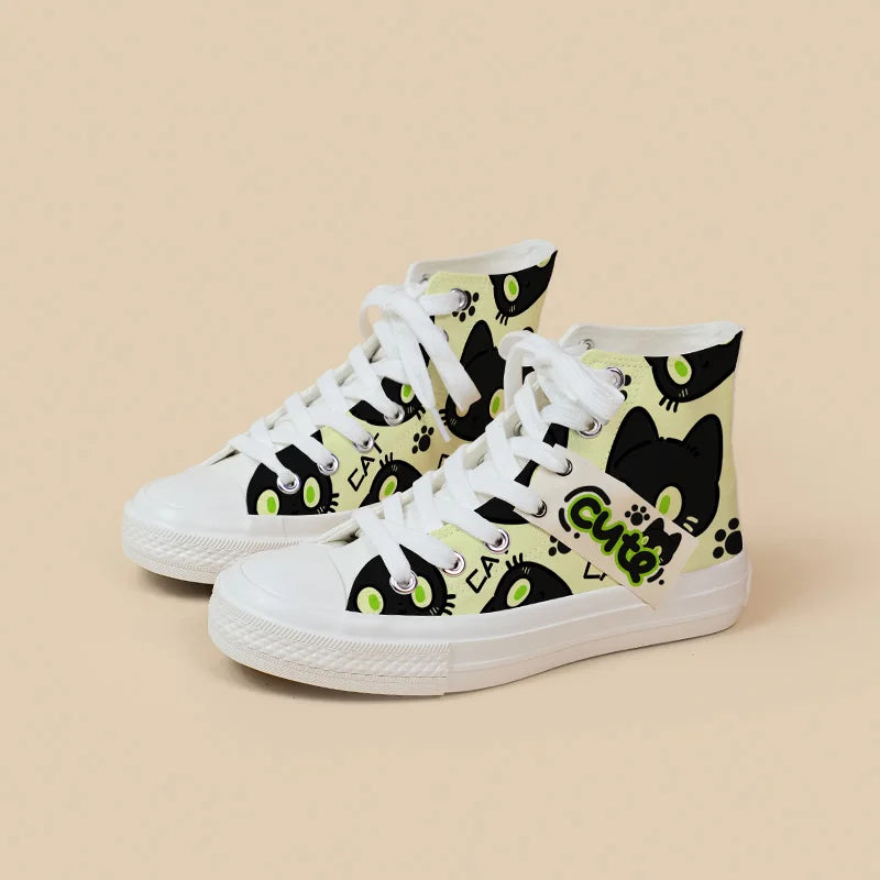 White high-top sneakers with black cat illustrations and 'cute' text on a beige background