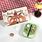 Cute red panda nintendo switch case on a white table with a red and white checkered table cloth