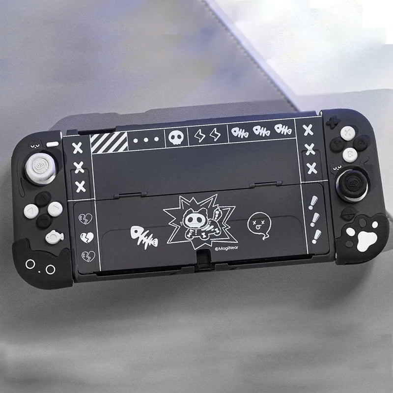 Black handheld gaming console with white graphics on a gray background