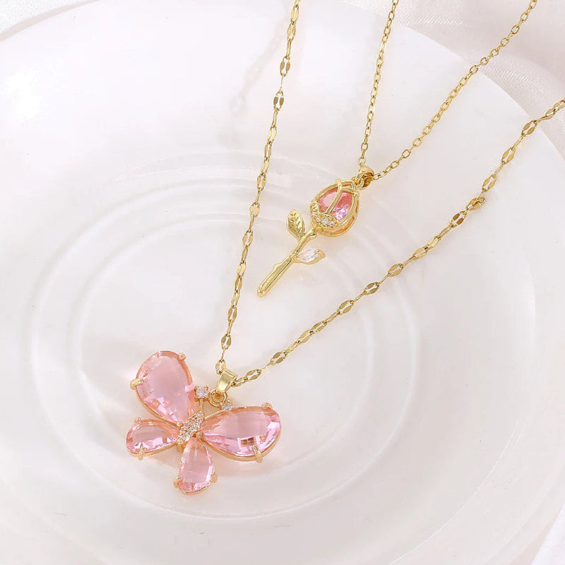 Kawaii Enchanting Butterfly Rose Necklace on a glass plate