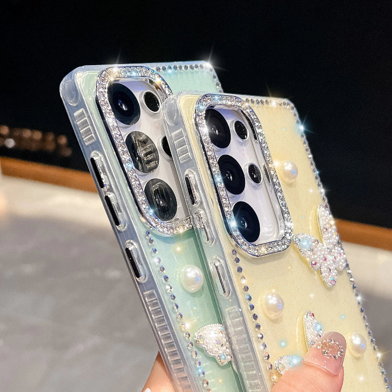 Two phone cases with decorative elements held against a blurred background one case is mint green the other pastel yellow