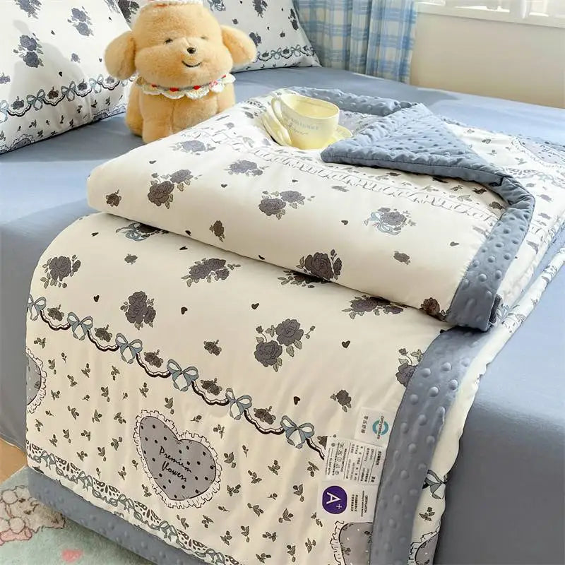 Kawaii Spring Quilts, the set being shown is Cute Rose Design, displayed on a bed half open.