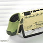 Green and beige phone case with cartoon designs on a white background