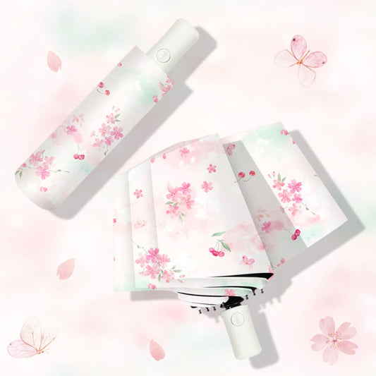 Handheld Pretty Cherry Blossoms Umbrella with floral design on a light pink background