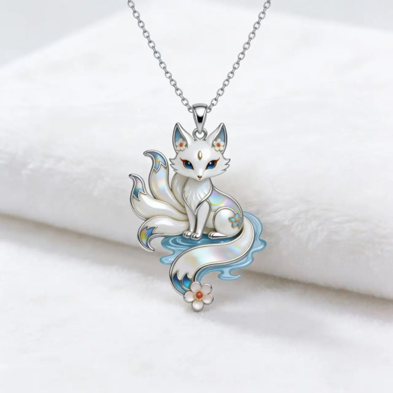 Silver Kitsune pendant necklace on a white background