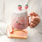 Kawaii Pink Strawberry Mug Set held by a woman