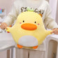 A women stretching a Kawaii Derpy Duck Plushie